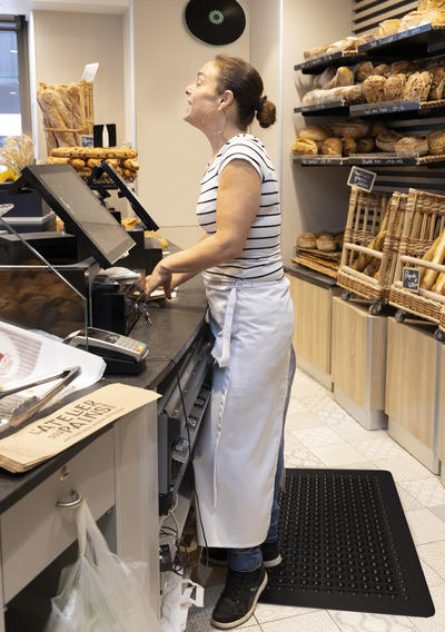 A baker wearing a short apron